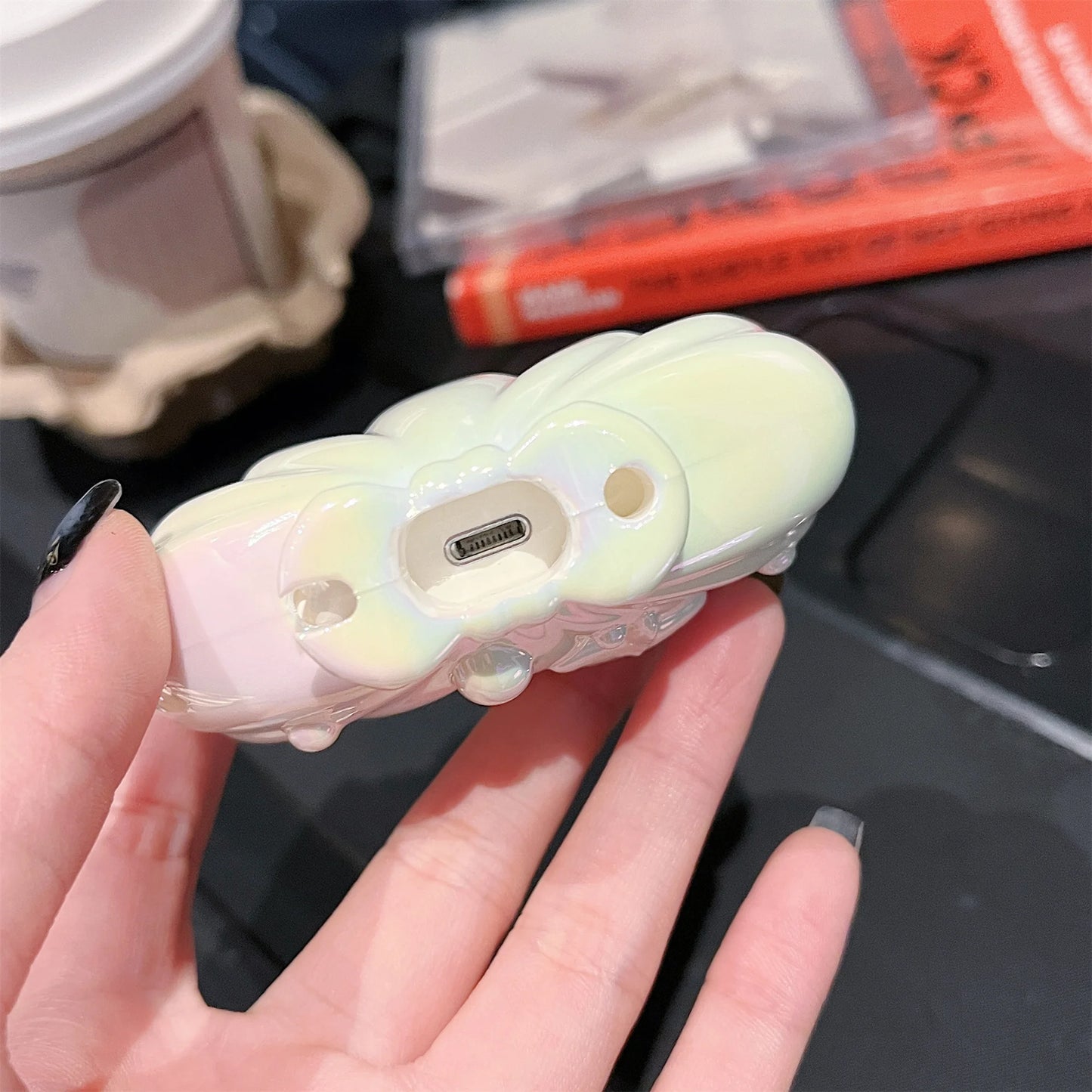 Funda protectora para AirPods diseño de concha marina